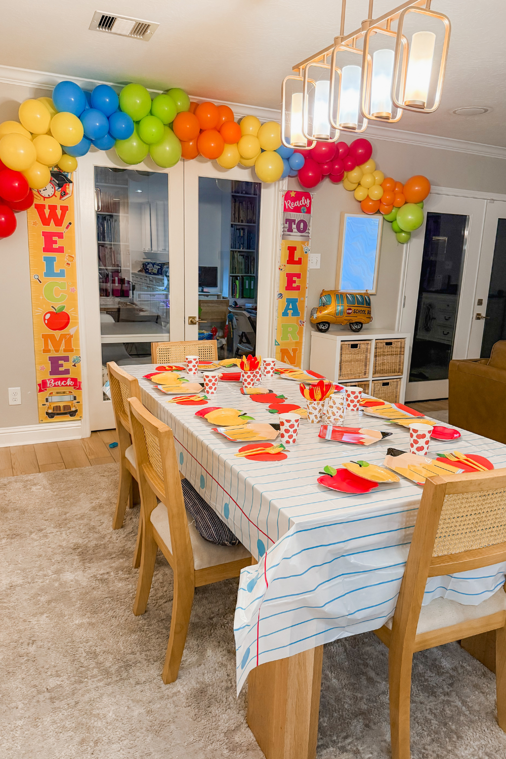 Back to homeschool table decorations with festive breakfast setup, colorful school-themed décor, and family tradition for the first day of homeschool