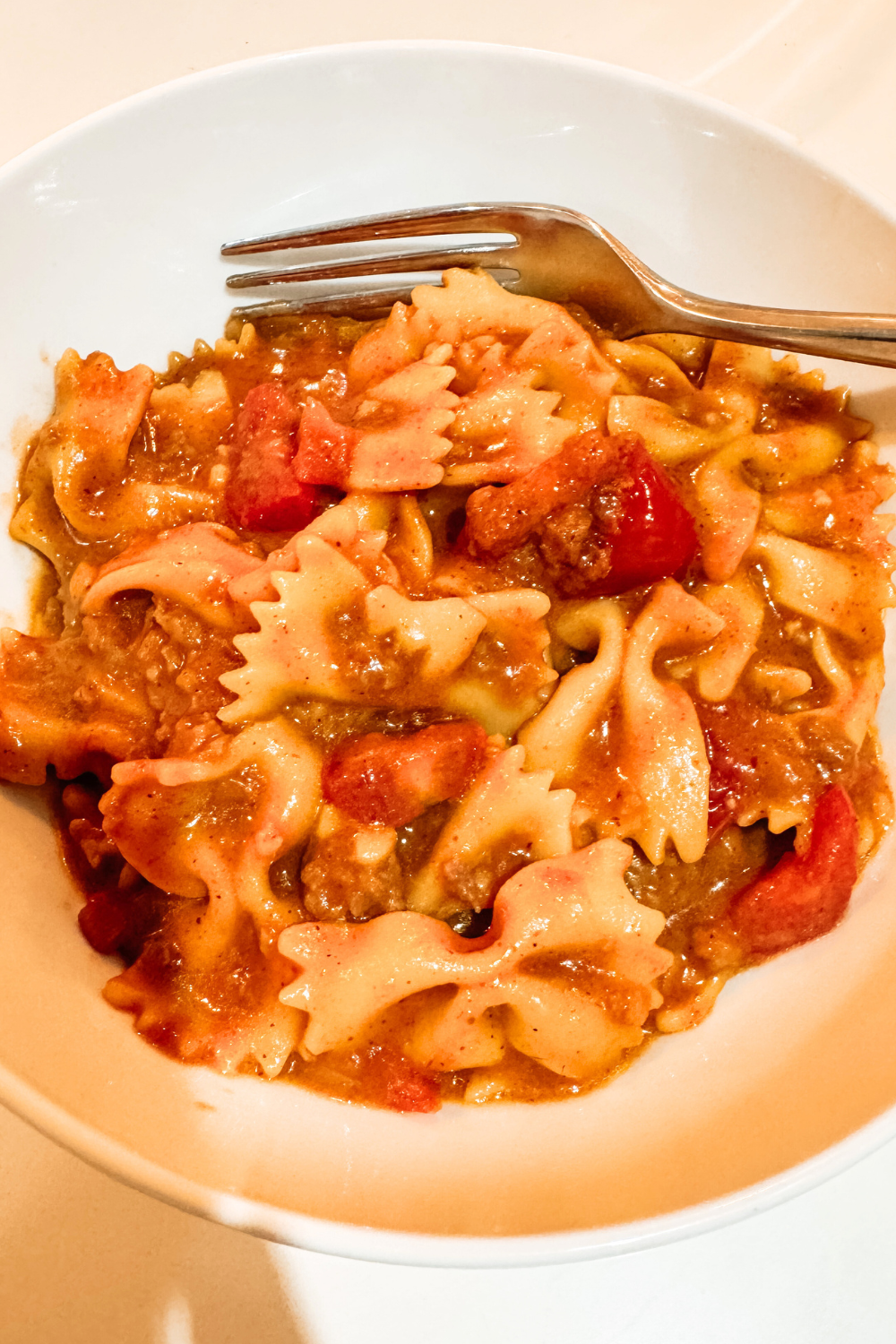 Vegan Tex-Mex taco pasta made with plant-based protein, beans, and pasta, a hearty family-friendly dinner prepared in a homeschool kitchen.